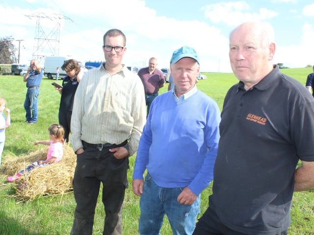 Supporting the big threshing day at Ballydown (from left) Patrick Pyers, Norman Reid and Geoff Davidson