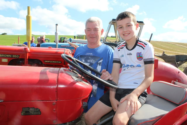 Joe McAnearney with his grandson Jacob at the threshing at Ballydown last Saturday