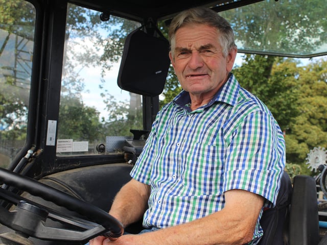 Local dairy farmer George Cromie arrives at the threshing day at Ballydown
