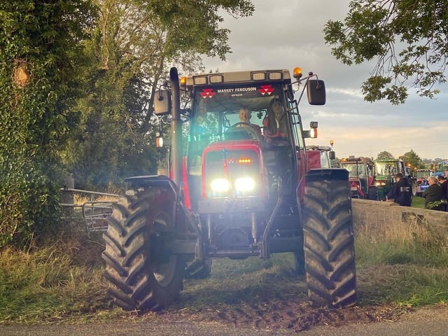 Member Harry Givan proudly showcasing his tractor