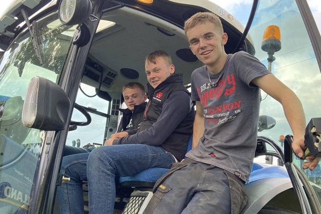 The lads sitting ready to go with the tractor run