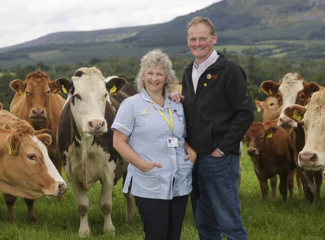 UFU president David Brown and his wife Mary, who is a Marie Curie Nurse, at the family farm in Florencecourt. The couple are encouraging people to take part in Marie Curie’s Twilight Walk. Picture: John McVitty