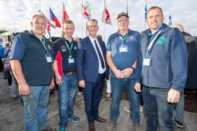 Agriculture Minister Edwin Poots MLA pictured with Northern Ireland competitors at the National Ploughing Championships in Ratheniska, Co. Laois. Pictured, from left, Adrian Jamison, Andrew Gill, Rodney Crawford and David Wright.