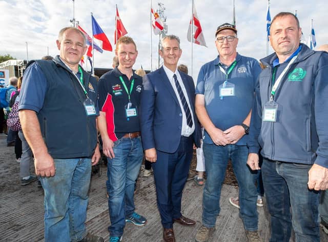 Agriculture Minister Edwin Poots MLA pictured with Northern Ireland competitors at the National Ploughing Championships in Ratheniska, Co. Laois. Pictured, from left, Adrian Jamison, Andrew Gill, Rodney Crawford and David Wright.