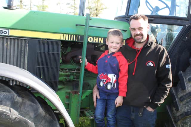 Andrew and Spencer Corbett arrive for the tractor run at the Gall Bog