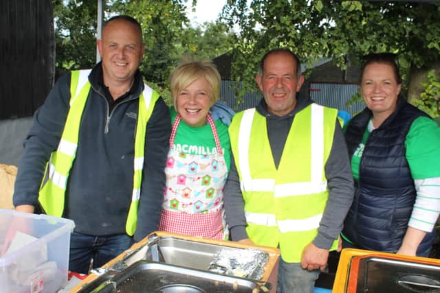 Pictured are the helpers at the burger stall last Saturday (from left) Gordon and Barbara Hutchinson, Alan and Jennifer Crory