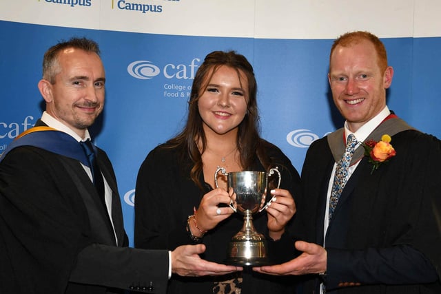 Ashleigh Larkin (Randalstown) was presented with the Golf Ireland Cup awarded to the top Greenkeeping Cadet at the Greenmount Campus Graduation Ceremony. Ashleigh was congratulated by Johnston Shaw (Horticulture Lecturer, CAFRE) and Adam Ferguson (Senior Lecturer, CAFRE). Pic: CAFRE
