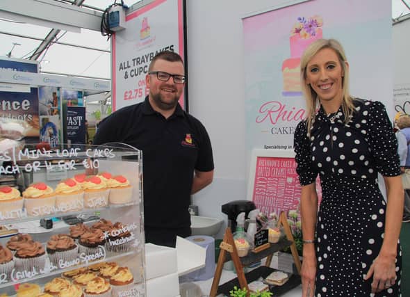 Pictured in the agri-food pavilion at Balmoral Show are Gordon Woolsley, Rhiannon’s Cakes and Bakes, Portadown, with Upper Bann MP Carla Lockhart. Picture: Julie Hazelton