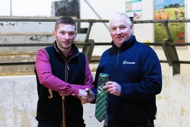 Club chairman Eddie O’Neill presents judge Jack O’Brien with a token of appreciation for judging the 2022 Dungannon in-lamb show