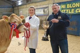 Alistair Martin presenting the Championship cup to Lucy Rodgers with Hillhead Unicorn. Pic: Bo Davidson