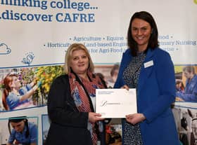 CAFRE Enniskillen Campus Certificate in Higher Education student Judith Todd (Dromore, Co Down) receives a bursary from Ruth Morrison, Downpatrick Racecourse.
