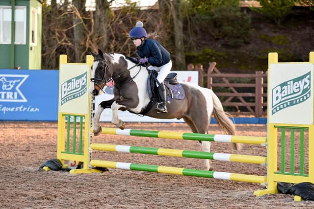 Leah Turkington riding Holiday Charisma, clear in the 70cm Showjumping