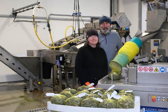 Simon Kennedy and his wife Kate O'Connor Kennedy, the team behind Killary Fjord Shellfish, pictured with their new packaging and labelling machine