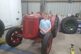nine-year-old Buddy Antcliff has well and truly been bitten by the vintage tractor bug, and together with his grandad Steve Lyne, has painstakingly restored a 1947 David Brown Cropmaster. Puic: Rachel Antcliff