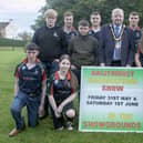 Mayor of Causeway Coast & Glens Council, Cllr Steven Callaghan, pictured with Cattle stewards from Finvoy YFC.