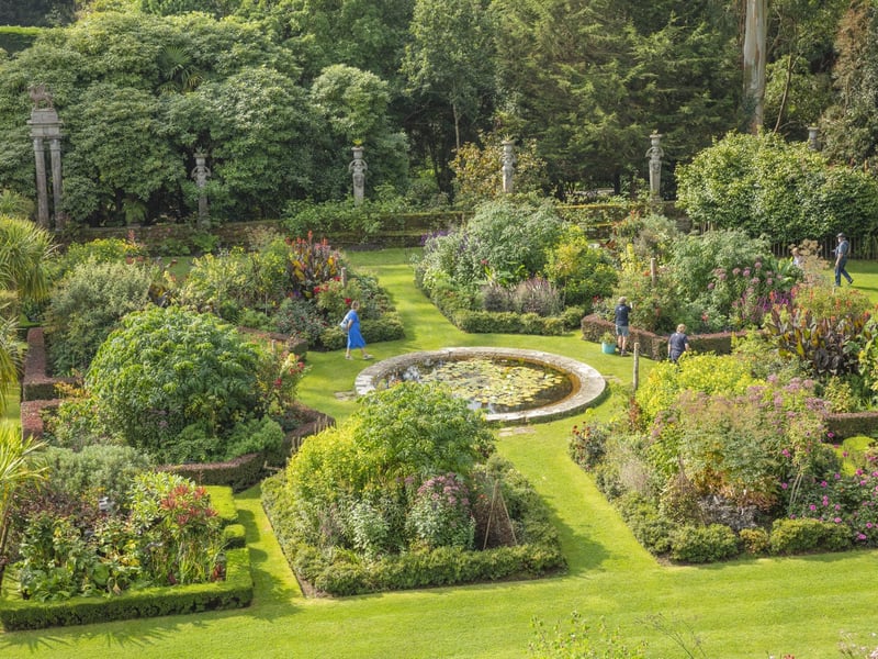 Visitors explore the summer borders in the formal Italian Garden at Mount Stewart. National Trust Images/James Dobson