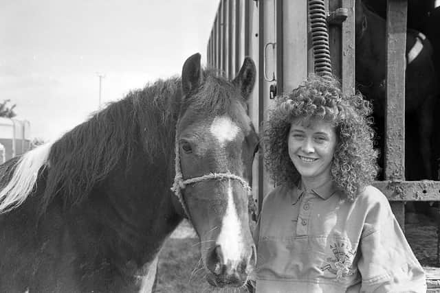 Pictured in September 1992 at the Ahoghill Horse Fair is Wendy Searles from Glengormley with Apache the horse. The premier championship award at the fair was awarded to Robert Campbell of Ballymena for his Clydesdale mare with foal. Picture: News Letter archives/Darryl Armitage