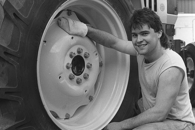 Jimmy Fearon putting the finishing touches to a two-wheel drive Lamborghini 774-80 at the Balmoral Show in May 1991. Picture: Eddie Harvey/News Letter/Farming Life archives