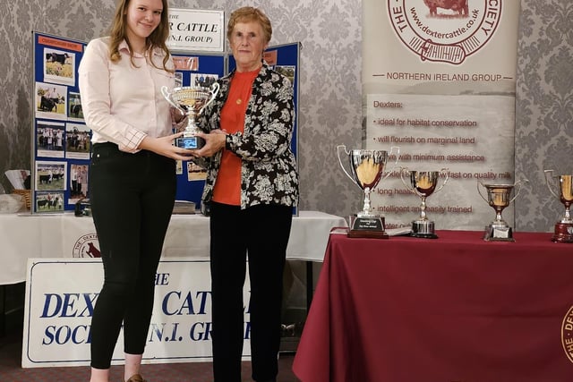 Grace Bloomer accepts a cups from Deirdre Hilton MBE for Clogher Valley Show Champion.