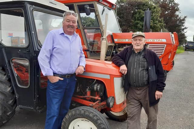 Dessie Hetherington from Ballyheather, Strabane, and Wilbert Robinson from Glenarm at the Bradley's Corner vintage tractor run. Picture: Darryl Armitage