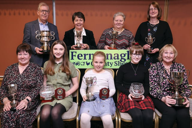 Winners of The Home Industries Section at Fermanagh Show are back from left, Brian Donaldson, Ingrid Logan, Florence Eames and Ashley Brown. Front from left, June McIlfatrick, Ella Wylie, Ellie Henderson, Clodagh Fee and Violet Cassidy.