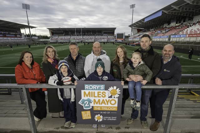 Pictured (l-r) Jodie Best, Julie Galbraith, Chief Business Officer at Arachas, Rory Fletcher, Roger Johnston, CEO of Axial 3D, Rory Best, former Ireland and Ulster Rugby Captain, Zac Fletcher, Kerry Fletcher, Harris Fletcher, Oran Fletcher and Phil Alexander, CEO of Cancer Fund for Children. Zac (front middle) and his family were supported by Cancer Fund for Children following his cancer diagnosis.