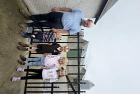 Mr Ian Buchanan, host farmer with his grandchildren.