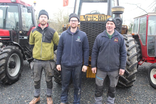 William, Edward and Mervyn Fegan wait for the start of the tractor run