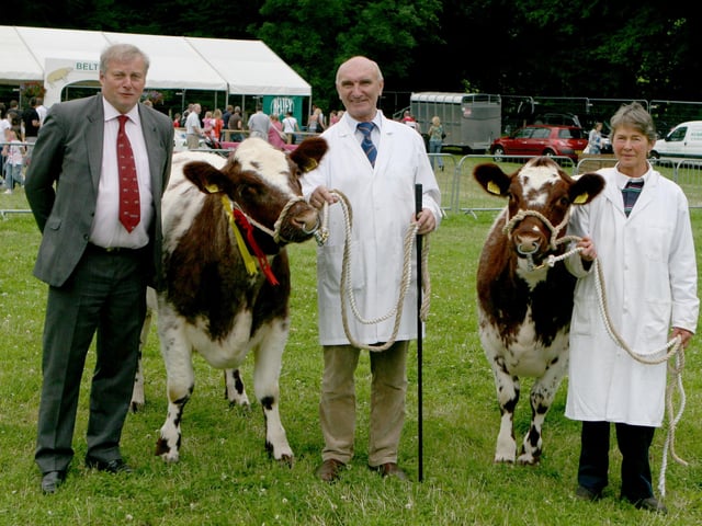 We were wondering if any of our readers might be able to identify those in the photographs.
