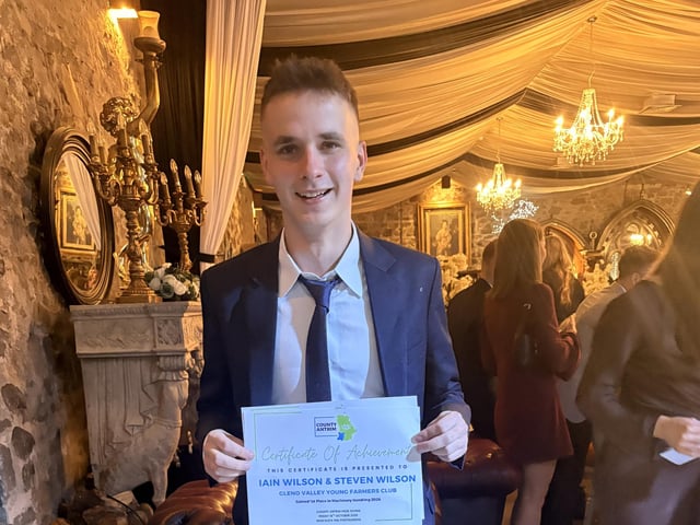 Patrick Lyle (Gleno Valley YFC) received the tractor handling certificate on behalf of Iain and Steven Wilson.