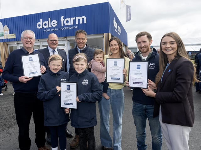 Winners of Dale Farm's Take 5 Balmoral Awards - L-R Albert Wallace, Charlotte and Lilly Boyd, Fred Allen, Dale Farm Chair, Cormac McKervey, Head of Agriculture at Ulster Bank, Rachel Rea (baby charlotte), Timmy McAuley and Gail McCullough