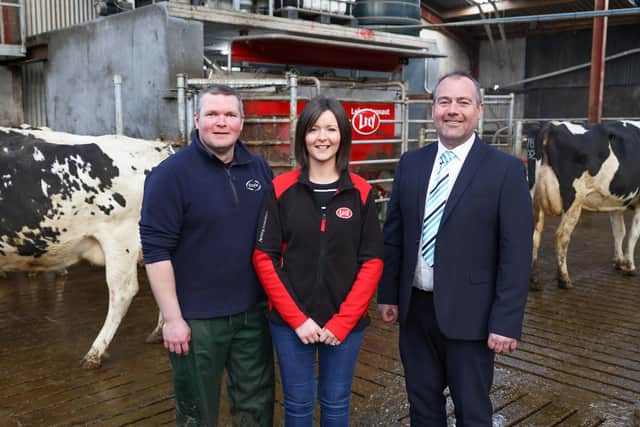 Ulster Bank business development manager Conor McNeill (right) pictured with Timmy and Karen Rea.