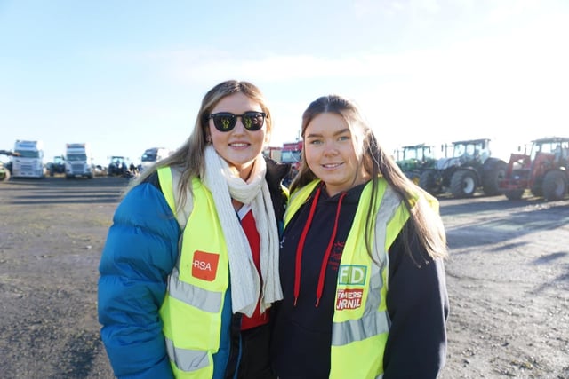Club members Ellie Macauley and Nicola Murray helping out at the tractor and truck run. Picture: Rathfriland YFC