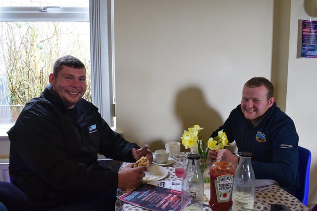 Willy Rea and Gareth Baird in for a bite to eat at the big breakfast which was held by Holestone YFC. Picture: Holestone YFC