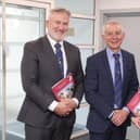 Ai Services' Group Chairman, Robin Irvine, (centre) with Chief Executive Officer, Larry Burke, and Group Scientist, Dr Debbie McConnell. Pic: McAuley Multimedia