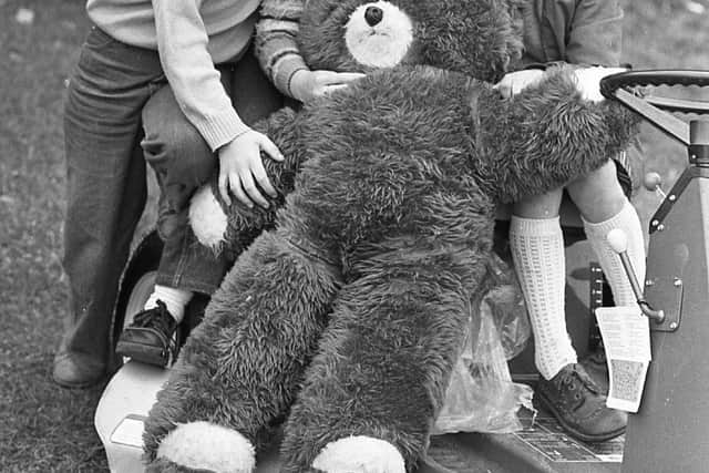 Pictured in June 1980 are Ballymena girls Paula Klewchuch, Christine McHugh and Caitlin Loughran, admiring one of the teddy bears on display at a stand at the Ballymena Show. Picture: Farming Life/News Letter archives/Darryl Armitage