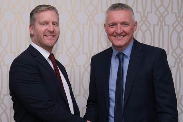 Northern Ireland Grain Trade Association, Immediate Past President, Patrick McLaughlin, right, congratulates Gary McIntyre, the new NIGTA President at their AGM. Photograph: Columba O'Hare/ Newry.ie