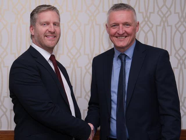 Northern Ireland Grain Trade Association, Immediate Past President, Patrick McLaughlin, right, congratulates Gary McIntyre, the new NIGTA President at their AGM. Photograph: Columba O'Hare/ Newry.ie