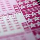 National Lottery are on the hunt for an unclaimed millionaire 