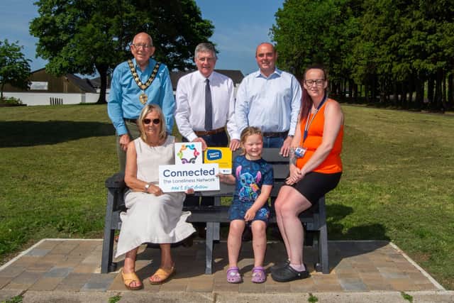 At the launch of the new Chatty Bench at Ballee Way, Ballymena: Mid&East Antrim Mayor Jackson Minford; Roy McClean, Housing Executive; Councillor Alan Barr; Marjorie Hawkins, Chair of the Loneliness Network; and local residents Macy Lee and Kirsty.