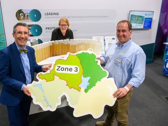 Minister Muir launches the opening of zone 3 of the Soil Nutrient Health Scheme with Rachel Cassidy, AFBI's Head of Catchment Sciences, and Andrew Thompson, CAFRE's Soil Health and Water Quality technologist.
