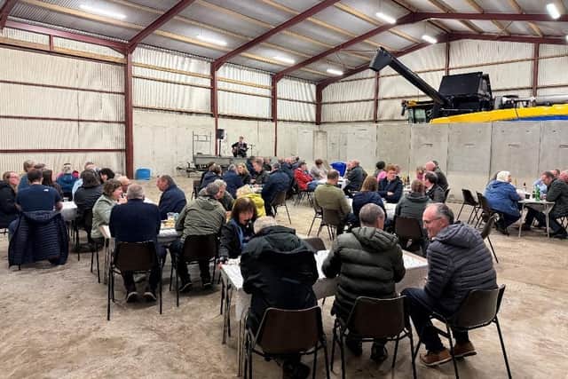 Members enjoying their hog roast hosted by county chair, Mark McCollum.