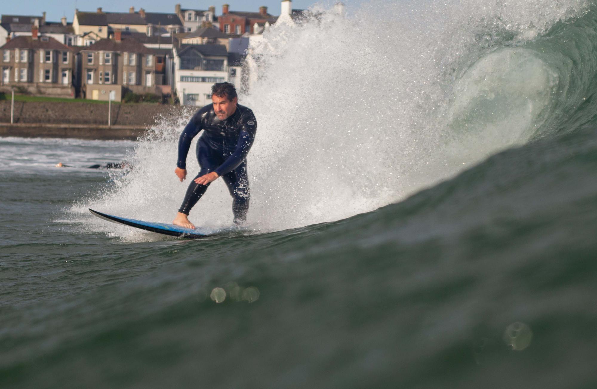 Andy Hill surfing in Portrush