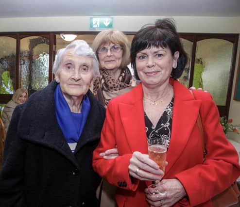 Arriving at the Fashion Show are Rita Dowds, Kathleen Boyle and Kathleen O'Mullan.