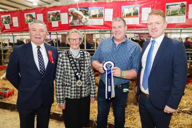 The second placed Best Kept Dairy Stall at the 2022 Royal Ulster Winter Fair in association with sole sponsor Danske Bank was awarded to Erne Holsteins. Pictured: Trade Stand Judge Ian Wilson, RUAS President Christine Adams, Stewart Baxter and Danske Bank’s Mark Noble. Picture: Brian Thompson