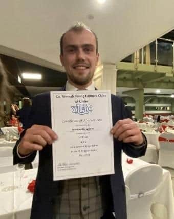 Collone YFC member, Matthew Livingstone, collecting his certificate of achievement