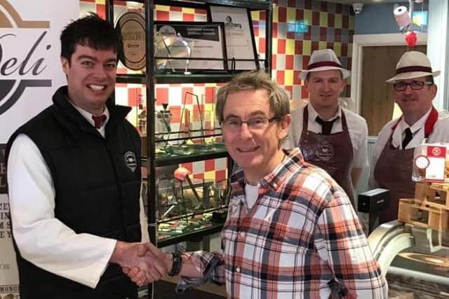 James Cunningham, of Cunningham’s in Kilkeel, overall winner in 2023, is pictured with chief of judges Nigel Barden at the final of the Farm Shop and Deli Awards.