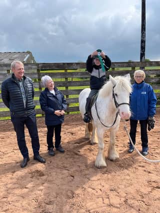 The Mid and West Antrim groups were able to make a donation to Mid Antrim Riding for the Disabled group.