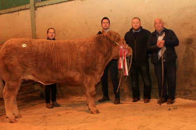 Overall champion and House Wife's Choice exhibited by Arthur and Alise Callaghan, pictured with judge Eamon McGarry and mart manager John Farnon