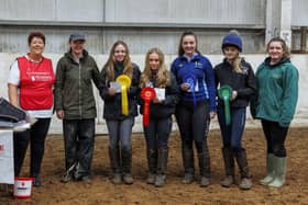 Margretta Chambers from Air Ambulance NI presenting the prizes to the winners in the 75cms class.  Also in the photo is Ruth Baird from the Gamekeepers Lodge & Lily Rose McGinn from Hugh McGinn Haulage.